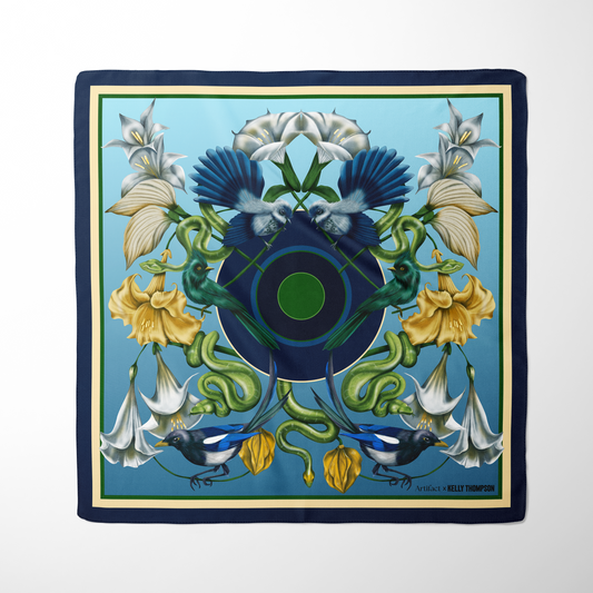 Decorative square scarf with floral and bird design on a white background